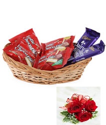 Mix chocolates basket with 5 Red roses