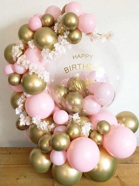Happy Birthday Printed balloon with 30 Gold and Pink balloons decorated with white flowers