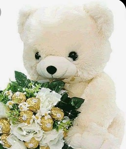 12 inches Teddy bear with 16 ferrero rocher chocolate and 4 white roses bouquet
