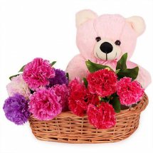 Six inches Teddy with 6 mix carnations in same basket