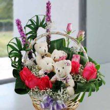 4 Teddies (6 inches each) with 6 red roses in the same basket