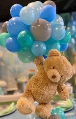 12 inches brown teddy bear holding 10 Blue helium gas pre filled blue and white balloons in his hand