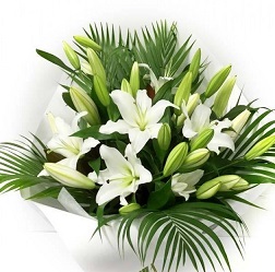 5 White Lilies Bouquet with palm leaves